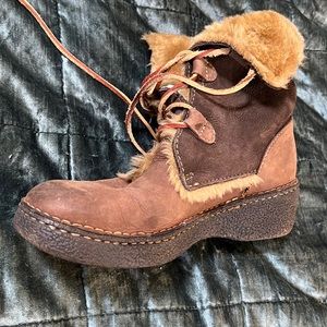 Fur lined boots.  B.O.C.